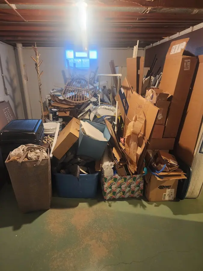 Roll-off dumpster container at job site for 15 Yard Dumpster Rental in Clearview